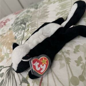 Ty Beanie Baby “Stinky” Skunk Plush
